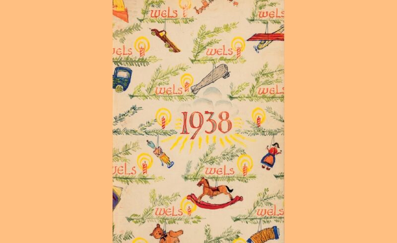 Seite aus dem Familienbuch Wels mit gezeichneten Tannenzweigen und Kerzen um die Jahreszahl 1938